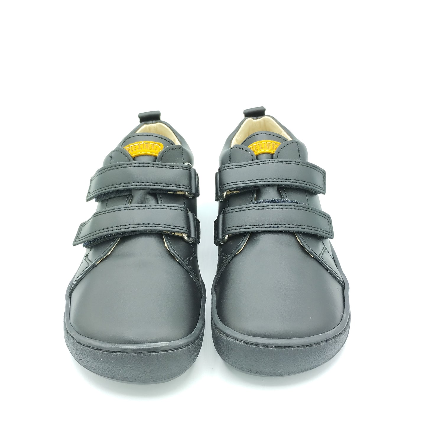 Semi-bota negra con contrafuerte de Flexi Nens